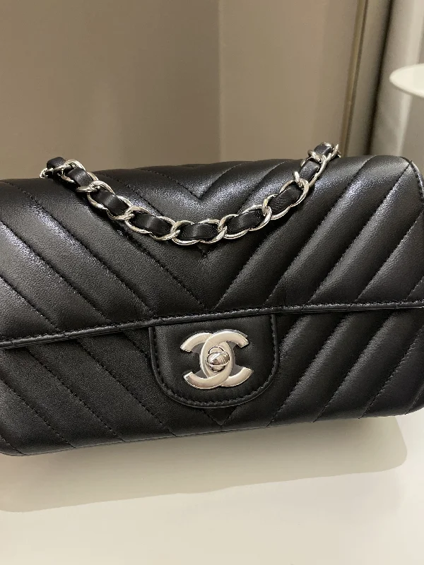 Chanel Handbag with Adjustable Strap for ComfortChanel Handbag with Adjustable Strap for ComfortChanel Classic Chevron Mini Rectangular Black Lambskin